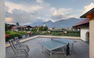 Terrazza soleggiata con vista sul verde